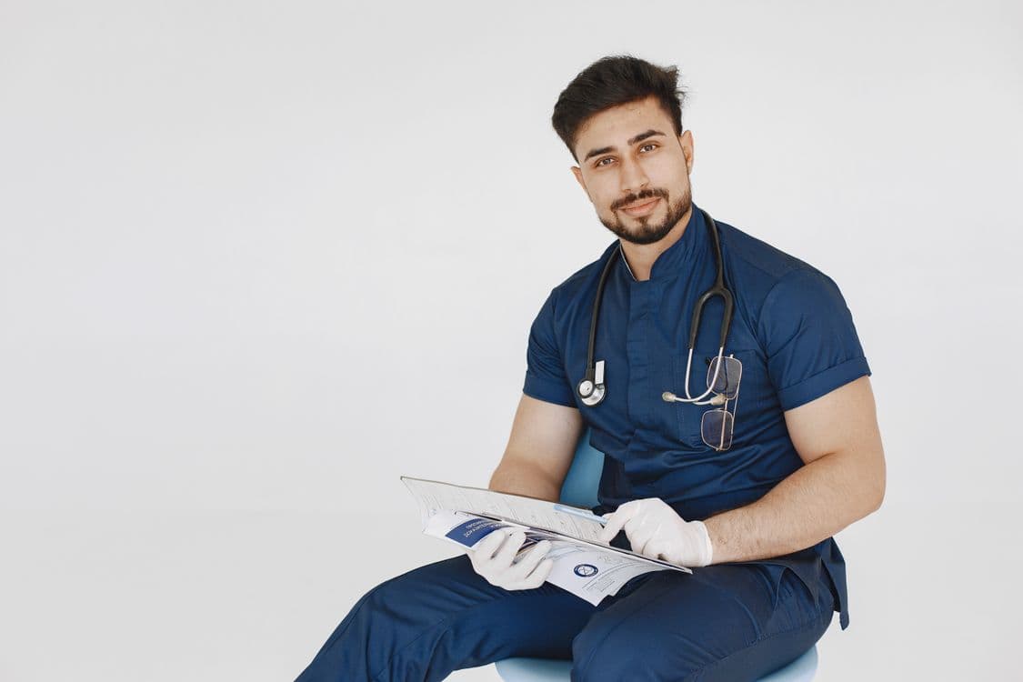 Attentive caregiver supporting patient at VR Healthcare